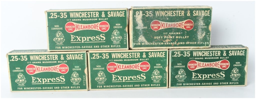 A Lot of 100 Remington Kleanbore Express .25-35 Winchester & Savage 117 Grain Cartridges: This lot features 100 rounds of vintage Remington UMC Kleanbore Express ammunition chambered in .25-35 Winchester & Savage, presented in five original 20-round cardboard boxes. The collection includes