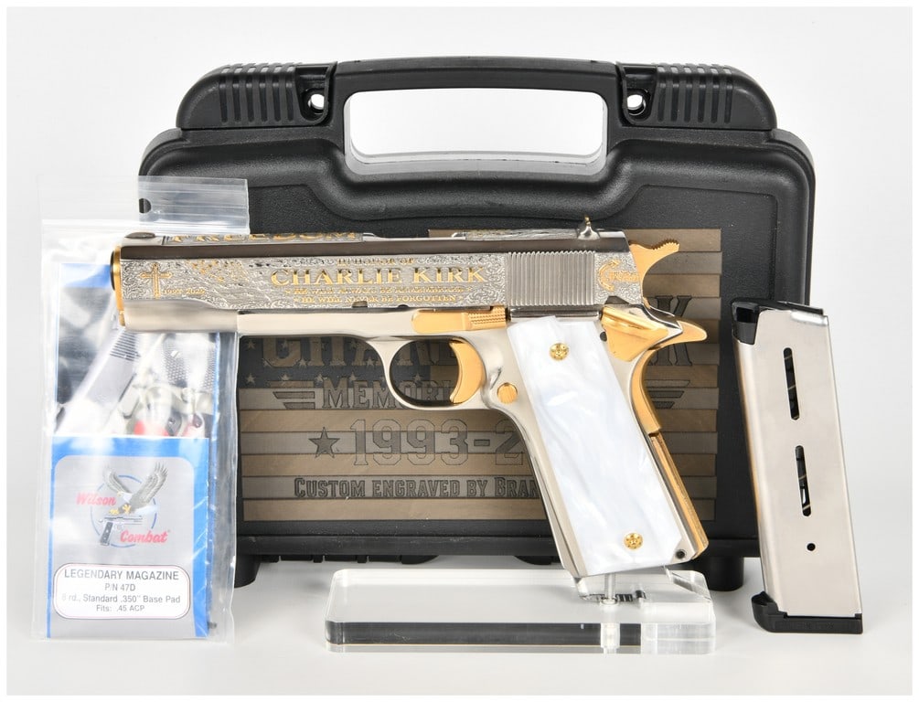 Charlie Kirk Engraved M1911-A1 Semi-Automatic Pistol .45 ACP 24K Gold Plated: This lot features a highly custom-engraved Rock Island Armory Model M 1911-A1 semi-automatic pistol chambered in .45 ACP. The firearm is equipped with a 5 inch barrel and features a high-polish nickel