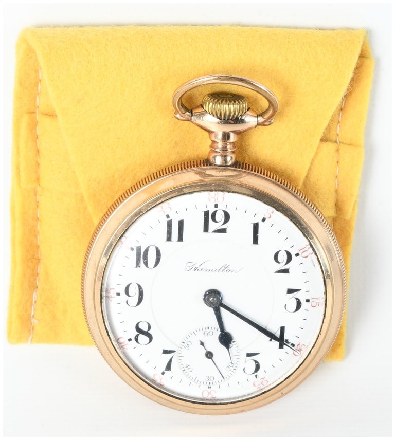 Hamilton Watch Co. Grade 940 Railroad Grade Gold Filled Open Face Pocket Watch: One Hamilton Watch Co. open face pocket watch, Grade 940, produced circa 1910. The timepiece features a white enamel dial with bold black Arabic hour numerals, a subsidiary seconds dial at the six o'c