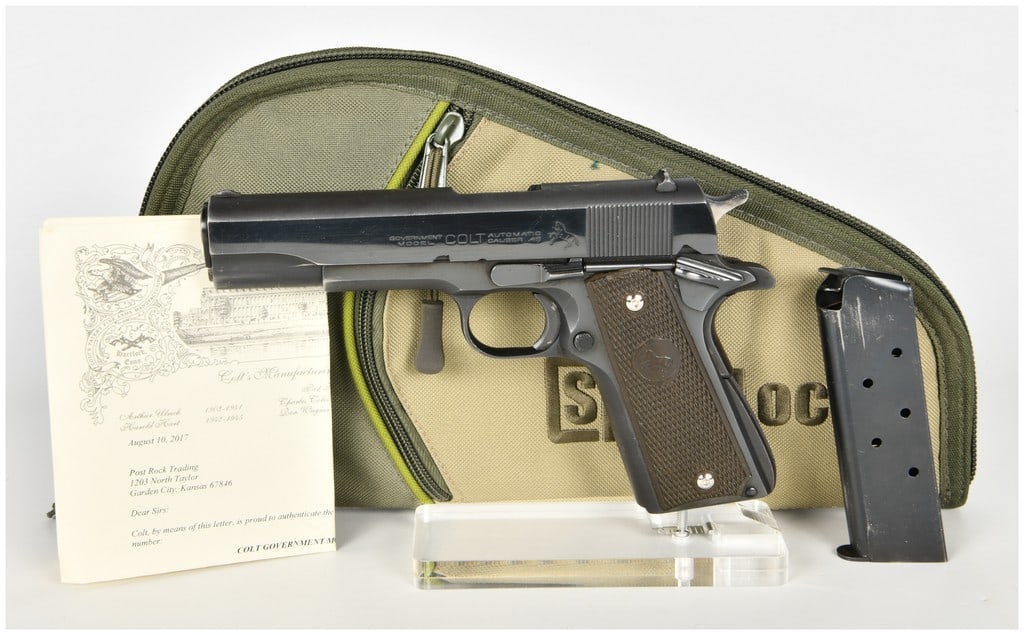 Colt Government Model Semi-Automatic Pistol .45 ACP with 5 Inch Barrel 1951: This semi-automatic pistol is a Colt Government Model chambered in .45 ACP and is accompanied by a factory Colt Archive Properties authentication letter. The firearm features a 5-inch barrel and is fi