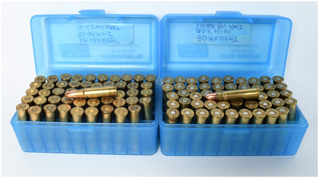 A Lot of 100 Rounds of .30 Herret Ammunition: This lot consists of 100 rounds of .30 Herret centerfire rifle ammunition, comprised of hand-loaded wildcat cartridges. The ammunition is housed in two blue plastic MTM Case-Gard flip-top storage boxe