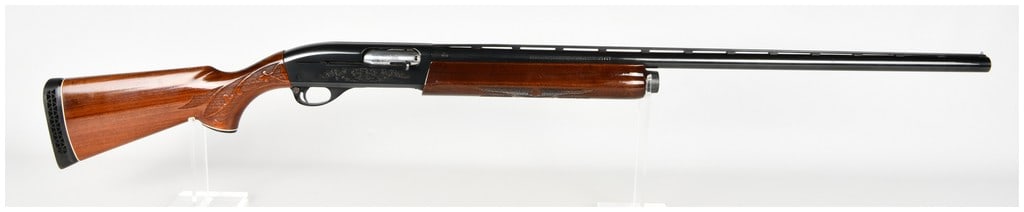 Remington Model 1100 Semi-Automatic Shotgun 12 Gauge with 30 Inch Barrel: This Remington Model 1100 is a gas-operated semi-automatic shotgun chambered for 12 gauge 3-inch magnum shells. Designed for waterfowl and long-range wingshooting, it features a full-length barrel equ