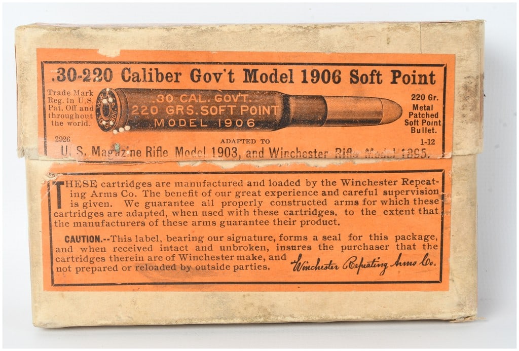 Winchester Repeating Arms Co. Model 1906 Ammunition .30-06 Springfield .30-220 Caliber Lot of 12: This lot consists of a partial box containing 12 original rounds of Winchester Repeating Arms Co. .30-06 Springfield ammunition, specifically labeled as .30-220 Caliber Gov't Model 1906. These smokele
