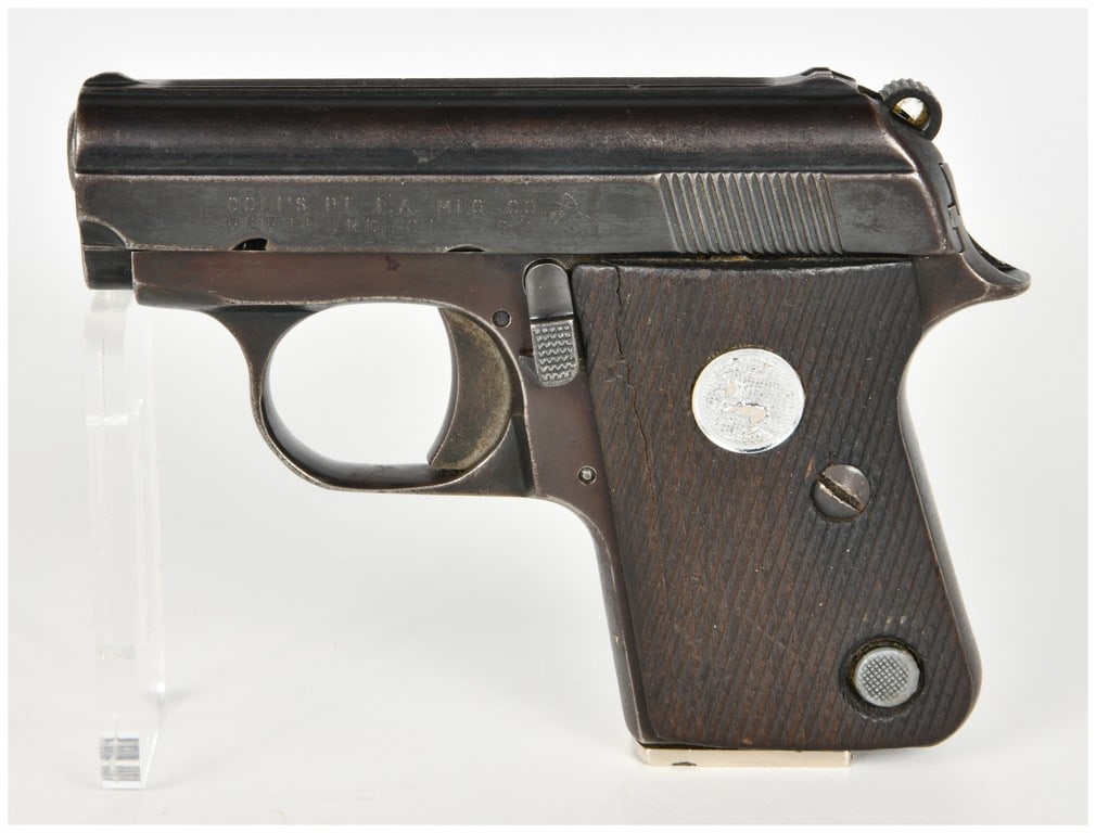 Colt Junior Semi-Automatic Pocket Pistol .25 Caliber with 2.25 Inch Barrel: This Colt Junior is a semi-automatic pocket pistol chambered in .25 caliber and equipped with a 2.25 inch barrel. The pistol features an external hammer, fixed sights integrated into the slide, and a 