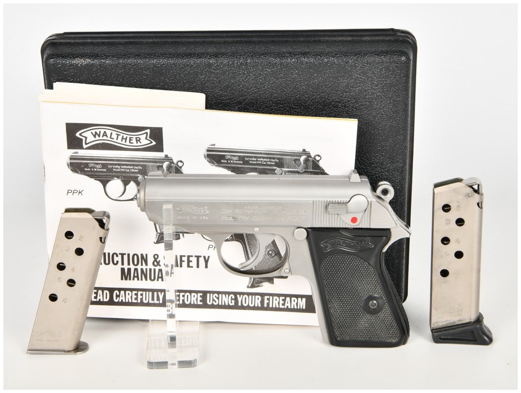 Walther Model PPK Semi-Automatic Pistol .380 ACP: This Walther Model PPK is a semi-automatic pistol chambered in .380 ACP, featuring a stainless steel finish and black checkered polymer grips with the Walther banner. Manufactured in the USA under lic