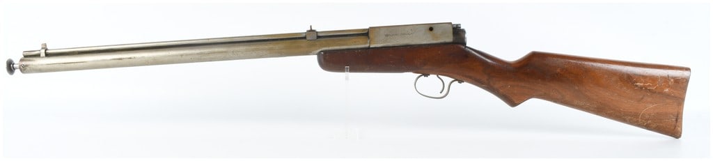 Benjamin Franklin Model 700 Pump Action Repeating Air Rifle .175 Caliber with 20 Inch Barrel: This Benjamin Franklin Model 700 is a pump-action pneumatic repeater air rifle chambered for .175 caliber BBs. It features an approximately 20-inch barrel and utilizes a front-mounted pump rod system 