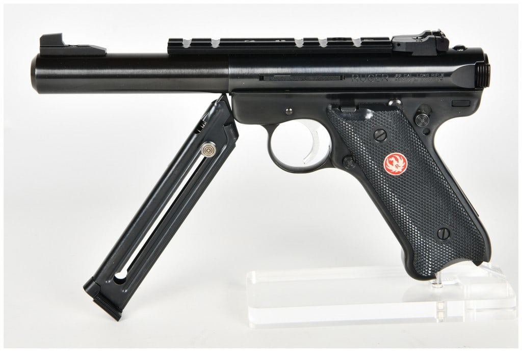 Ruger Mark III Target Semi-Automatic Pistol .22 LR with 5.5 Inch Bull Barrel: This Ruger Mark III Target is a semi-automatic rimfire pistol chambered in .22 Long Rifle, specifically configured for target shooting with a blued steel finish on its receiver and heavy bull barrel. 