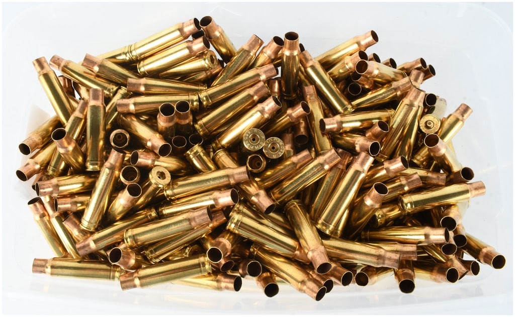 A Lot of 295 Remington-Peters .350 Remington Magnum Empty Brass Casings: This lot consists of a bulk collection of 295 empty, fired brass cartridge cases chambered for .350 Remington Magnum. Manufactured by Remington-Peters, these brass casings are high-quality components 
