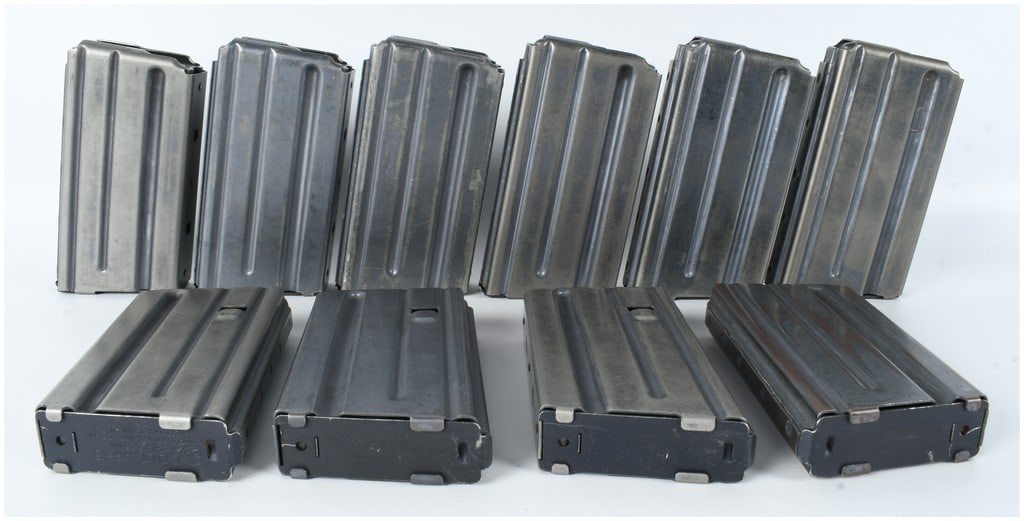 A Collection of 10 Colt AR-15 20-Round Magazines 5.56mm: This lot consists of 10 factory magazines manufactured by Colt for the AR-15 and M16 platforms. These are 20-round capacity box magazines designed for 5.56mm ammunition. Each magazine features a strai