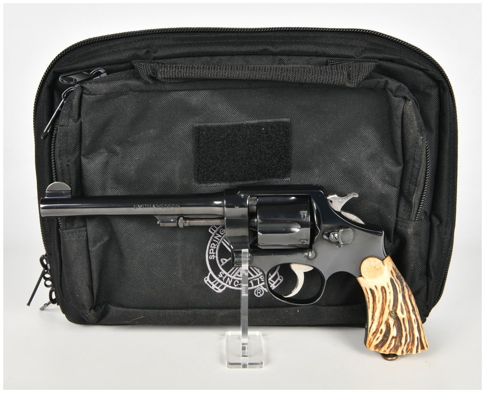 Smith & Wesson .44 Hand Ejector 1st Model Triple Lock Double-Action Revolver .44 S&W Special with: This lot features a single Smith & Wesson .44 Hand Ejector 1st Model, famously known as the Triple Lock, double-action revolver chambered for .44 S&W Special. This historic firearm is equipped with a 