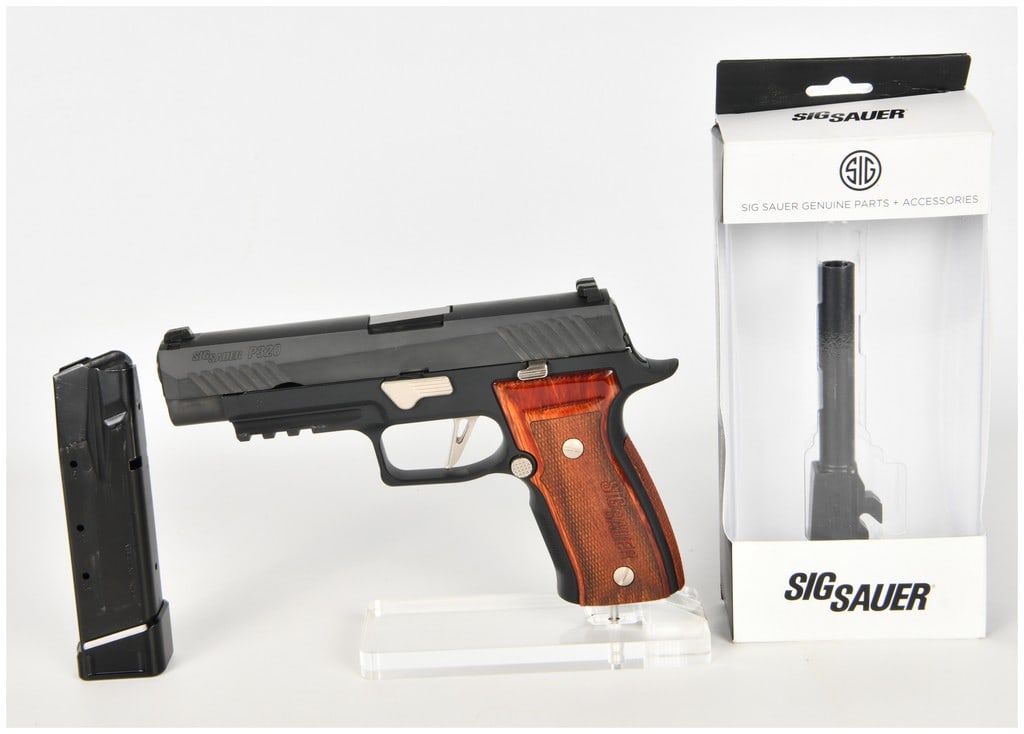 SIG SAUER P320 Semi-Automatic Pistol .40 S&W with 4.7 Inch Barrel: This SIG SAUER P320 is a semi-automatic pistol chambered in .40 S&W, featuring a modular design with an additional accessory barrel chambered in .357 SIG. The firearm is equipped with a 4.7-inch barre