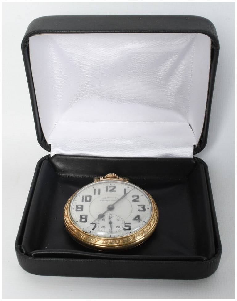Hamilton Railway Special 10 Karat Gold Filled Open Face Pocket Watch: A single Hamilton Watch Co. Railway Special open-face pocket watch featuring a 10 karat gold-filled case. The white dial is printed with bold black Arabic hour markers and a railroad-style outer minut