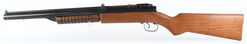 Benjamin Model 342 Multi-Pump Pneumatic Air Rifle .22 Caliber: This Benjamin Model 342 is a multi-pump pneumatic air rifle chambered in .22 caliber. The rifle features a brass barrel and receiver assembly with a blackened finish that shows significant wear across