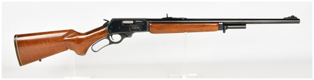 Marlin Model 1895S Lever Action Rifle .45/70 Gov't with 22 Inch Barrel: This Marlin Model 1895S is a lever action rifle chambered in the powerful .45/70 Gov't cartridge. The firearm features a deep blued finish on the receiver and barrel, complemented by a smooth walnut s