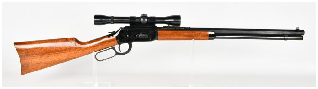 Winchester Model 94 Lever Action Rifle .30-30 with 26 Inch Octagonal Barrel 1967: This Winchester Model 94 is a Canadian Centennial commemorative lever-action rifle chambered in .30-30 Winchester caliber. It is configured with a 26-inch octagonal blued barrel and a full-length tubu