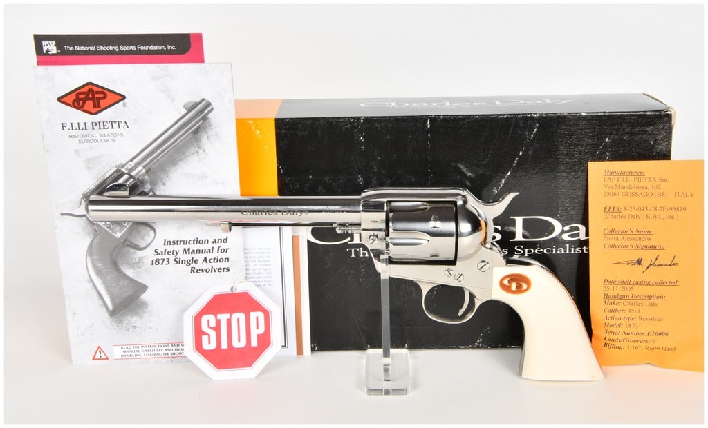 Charles Daly Model 1873 Single-Action Revolver .45 LC with 7.5 Inch Barrel: This is a single-action revolver, a reproduction of the 1873 model manufactured by F.lli Pietta in Italy for Charles Daly. Chambered in .45 Long Colt, the firearm features a 7.5-inch barrel with a pol