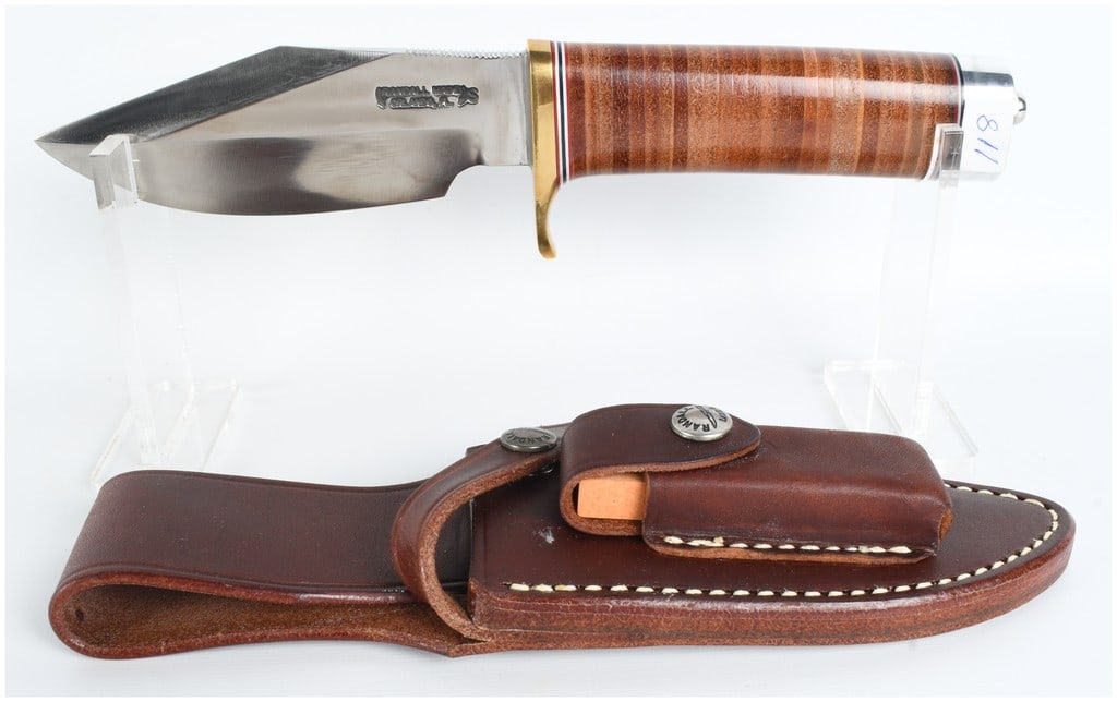 Randall Made Knives Model 19 Bushmaster Stainless Steel Hunting Knife: A custom fixed blade hunting knife and matching leather sheath manufactured by Randall Made Knives of Orlando, Florida. This is the Model 19 Bushmaster design. The stainless steel blade features a hea