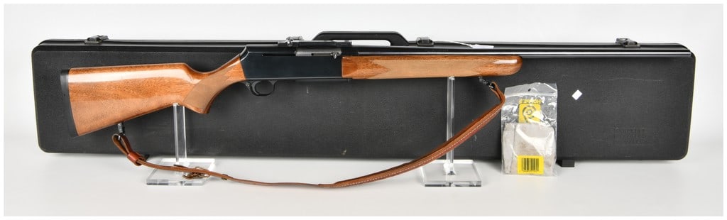 Browning BAR Semi-Automatic Rifle 7mm Remington Magnum with 24 Inch Barrel: This Browning BAR is a gas-operated semi-automatic rifle chambered in 7mm Remington Magnum, designed for big-game hunting. It features a 24-inch barrel with a high-gloss blued finish that extends to t