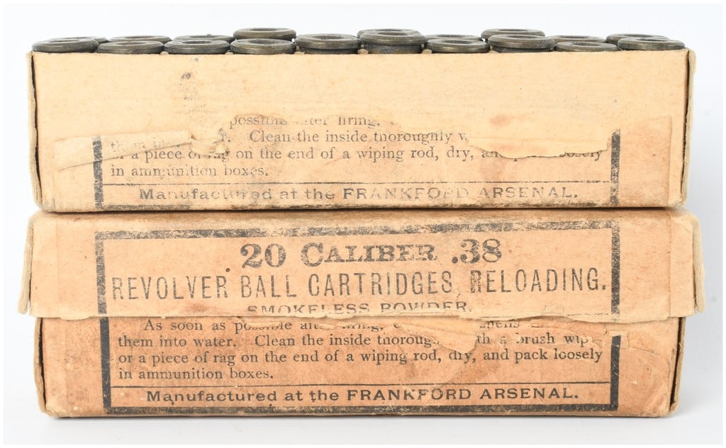 A Lot of 20 Frankford Arsenal .38 Revolver Ball Cartridges and 20 Empty Casings: This lot consists of two original cardboard ammunition boxes manufactured at the Frankford Arsenal containing 20 live rounds and 20 empty brass casings. The cartridges are .38 caliber revolver ball ro