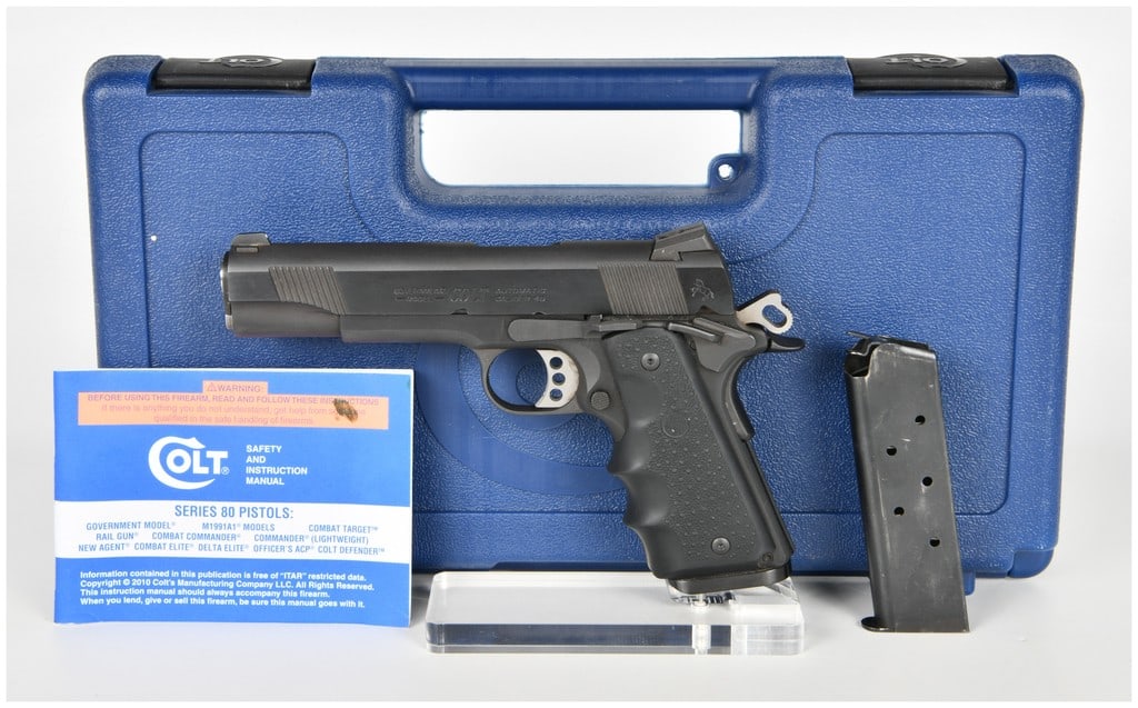 Colt Government Model 01980XSE Semi-Automatic Pistol .45 ACP with 5 Inch Barrel: This Colt Government Model 01980XSE is a semi-automatic pistol chambered in .45 ACP, configured as a centenary commemorative edition for the 1911 platform. It features a 5-inch barrel and a matte blue
