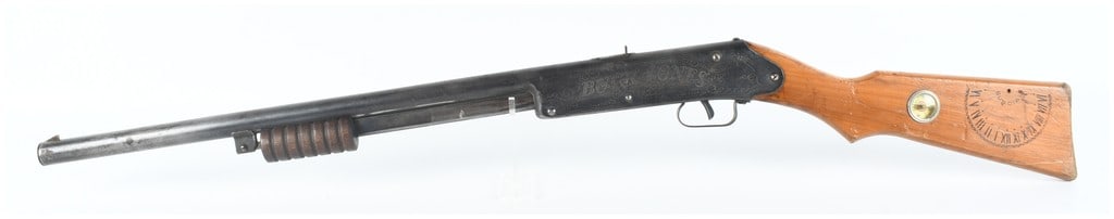 Daisy No. 107 Buck Jones Special Pump Action Air Rifle: This is a Daisy No. 107 Buck Jones Special pump-action air rifle, manufactured by the Daisy Manufacturing Company of Plymouth, Michigan. The air rifle is constructed with a metal barrel and receiver a