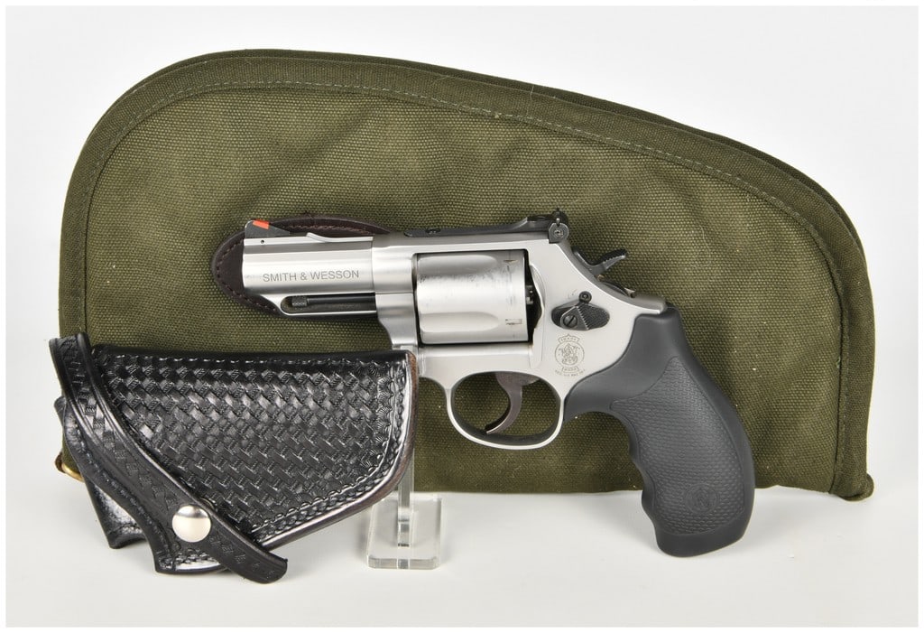 Smith & Wesson Model 69 Combat Magnum Double Action Revolver .44 Magnum with 2.75 Inch Barrel: This Smith & Wesson Model 69 Combat Magnum is a five-shot double action revolver chambered in .44 Magnum. It features a stainless steel finish and an approximately 2.75-inch barrel with a full-length 