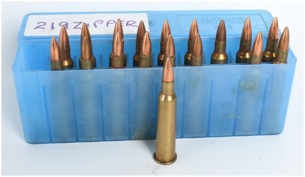 A Lot of 18 Rounds of Remanufactured .219 Zipper Centerfire Rifle Ammunition: This lot consists of 18 rounds of remanufactured .219 Zipper centerfire rifle ammunition. These cartridges feature rimmed brass cases topped with copper-jacketed pointed bullets. The rounds are stored