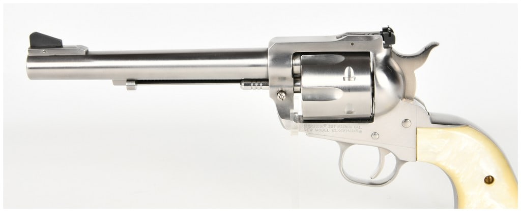 Ruger New Model Blackhawk Single Action Revolver .357 Magnum with 6.5 Inch Barrel: This Ruger New Model Blackhawk is a single-action revolver chambered in .357 Magnum and is also capable of firing .38 Special ammunition. The firearm is constructed from brushed stainless steel and fe