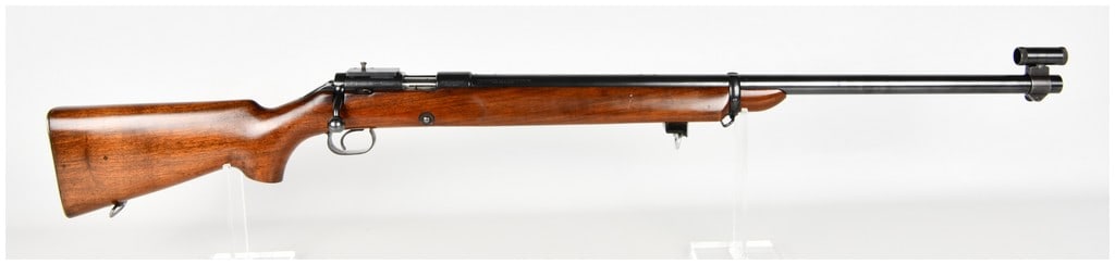 Winchester Model 52 Bolt Action Target Rifle .22 Long Rifle: This Winchester Model 52 bolt action target rifle is chambered for .22 Long Rifle and designed for precision competitive shooting. The firearm features a heavy blued barrel and receiver mounted in a o