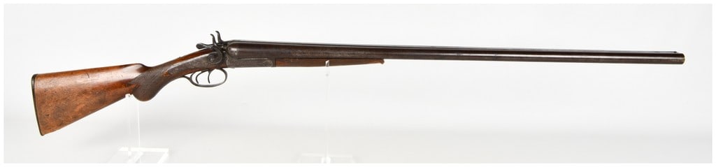 Saxton Side By Side Hammer Shotgun 12 Gauge with 32 Inch Barrels Antique: This Belgian made side by side hammer shotgun is chambered in 12 gauge and features exceptionally long barrels constructed of laminated steel. The intended configuration is for field use, featuring a 