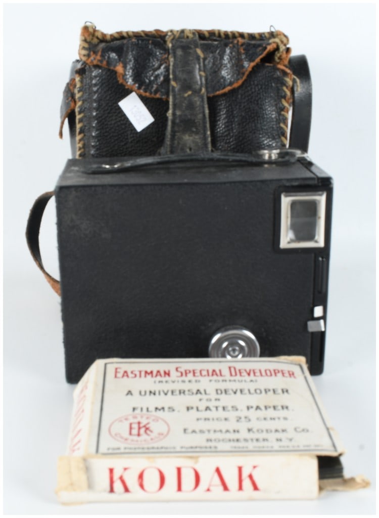 Eastman Kodak Brownie Target Six-20 Box Camera with Leather Case and Eastman Special Developer: This vintage photographic set consists of an Eastman Kodak Brownie Target Six-20 box camera, a hand-stitched leather carrying case, and an original box of Eastman Special Developer. The camera is cons