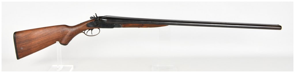 Hartford Fire Arms Co. Side-by-Side Hammer Shotgun: This side-by-side break-action shotgun is designed with external hammers and double triggers, representative of early twentieth-century American trade-brand firearms. The barrels feature a blued finis