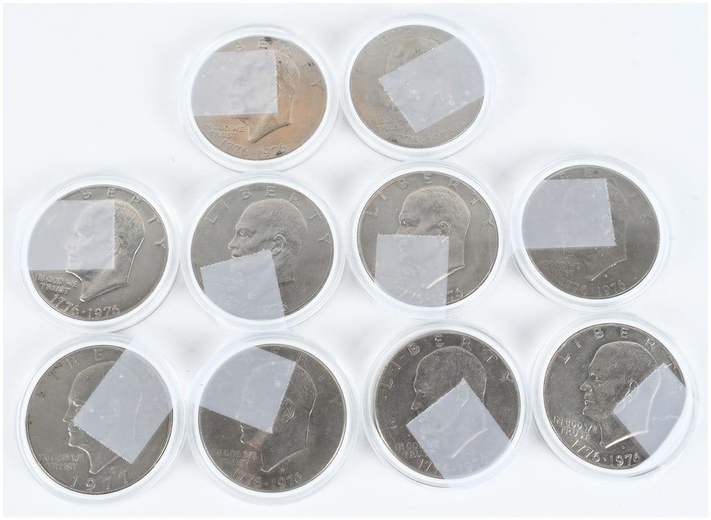 A Collection of US Eisenhower One Dollar Coins: A collection of US Eisenhower one-dollar coins comprising Bicentennial 1776-1976 and 1977 issues. The group includes examples featuring the Denver (D) mint mark. Reverse designs include the Bicentenni