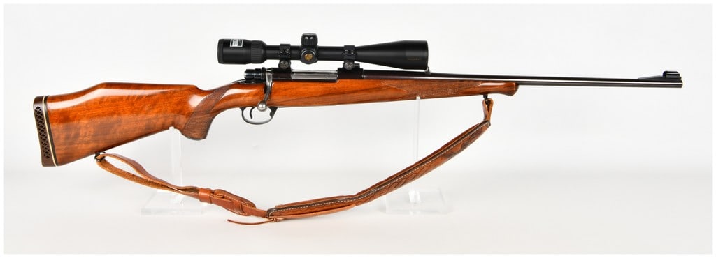 Tradewinds Husky Model H-5000 Bolt Action Rifle 7mm Rem. Magnum: This Tradewinds, Inc. Husky Model H-5000 is a bolt-action sporting rifle chambered in 7mm Rem. Magnum and built upon a Swedish-manufactured HVA action. The firearm features a blued steel barrel and re