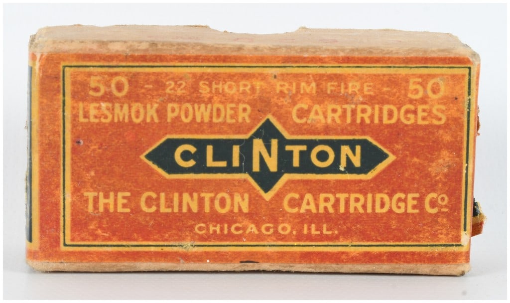 A Lot of 50 The Clinton Cartridge Co. .22 Short Rim Fire Ammunition: This lot consists of 50 cartridges of .22 Short Rim Fire ammunition manufactured by The Clinton Cartridge Co. of Chicago, Illinois, originally sold in a vintage two-piece cardboard box. The cartridges