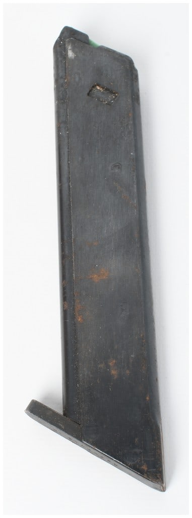 Hi-Standard Semi-Automatic Pistol Magazine .22 LR: This lot consists of one original Hi-Standard semi-automatic pistol magazine chambered for .22 LR. The magazine body is constructed from blued steel and features a vertical loading slot on the right s