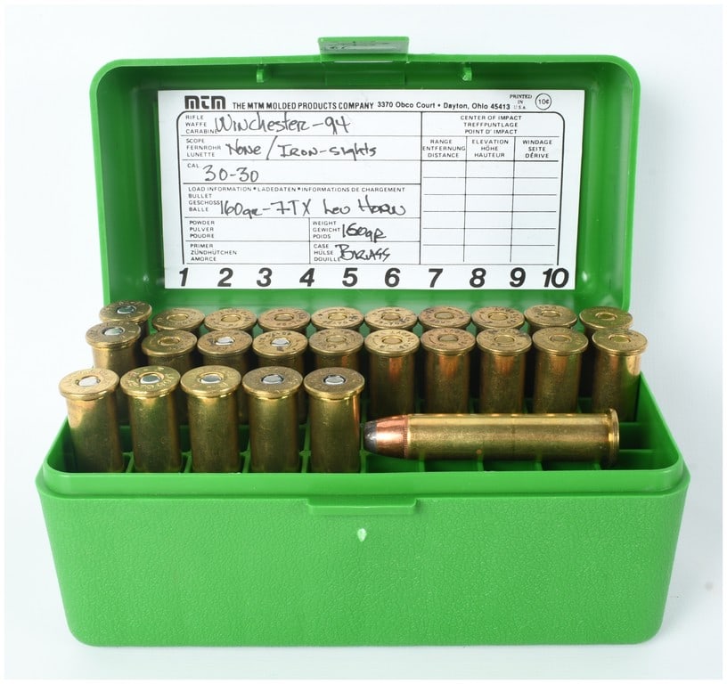 A Lot of 26 Rounds of Mixed .45-70 Government Ammunition: This lot consists of 26 rounds of .45-70 Government centerfire ammunition presented in a green MTM Molded Products Company plastic case. While the handwritten load data label applied to the interior o