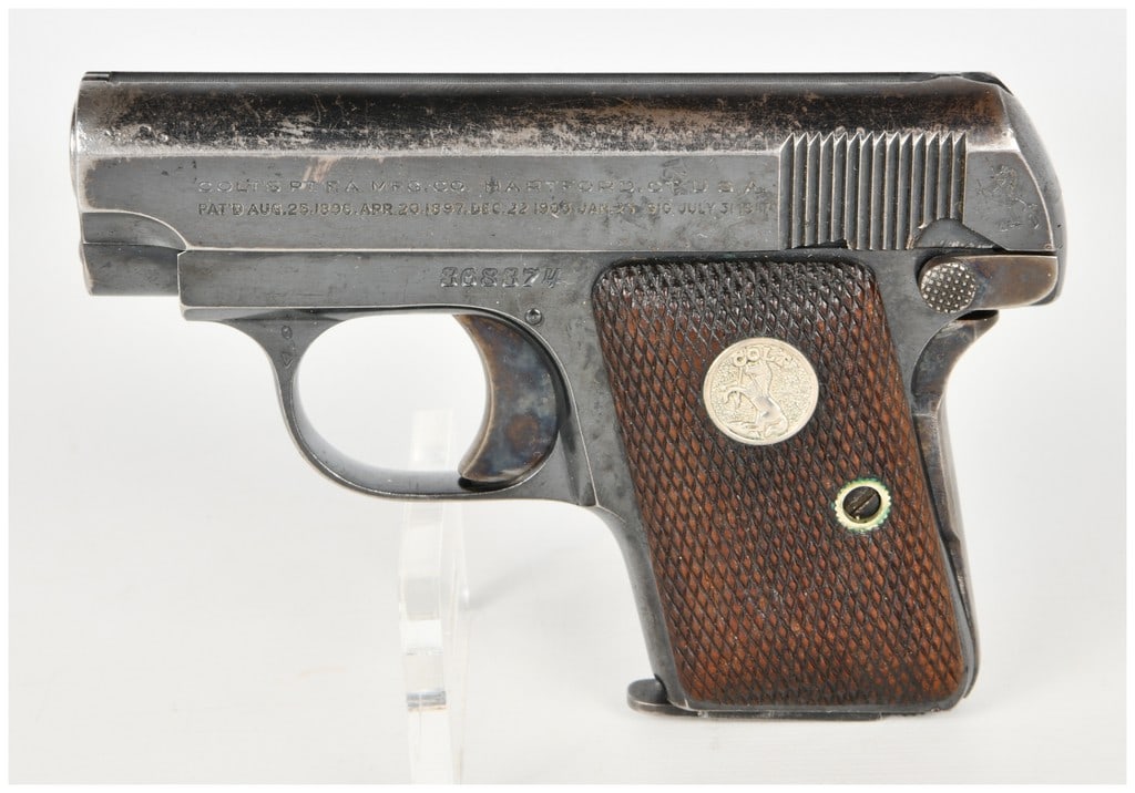 Colt Model 1908 Vest Pocket Hammerless Semi-Automatic Pistol .25 ACP with 2 Inch Barrel: The Colt Model 1908 Vest Pocket is a striker-fired, hammerless semi-automatic pistol chambered in .25 ACP, designed as a compact self-defense firearm. This specimen features a 2 inch barrel and is con