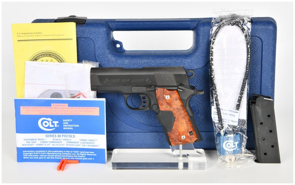 Colt New Agent Semi-Automatic Pistol .45 ACP with 3 Inch Barrel: This lot features a Colt New Agent semi-automatic pistol chambered in .45 ACP, designed for concealed carry with a lightweight alloy frame and a snag-free trench-style sight system. The firearm is equ