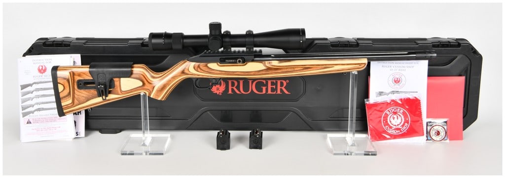 Ruger Custom Shop 10/22 Semi-Automatic Rifle .22 LR with 16.12 Inch Fluted Barrel: This is a semi-automatic Ruger Custom Shop 10/22 rifle chambered in .22 LR, designed as a high-performance competition or target rimfire firearm. It is equipped with a 16.12-inch cold hammer-forged, b