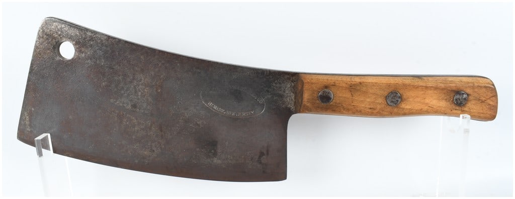 International Tool Co. Newark New Jersey Vintage Meat Cleaver: A professional-grade meat cleaver manufactured by the International Tool Co. of Newark, New Jersey. This tool features a heavy rectangular carbon steel blade with a slightly convex cutting edge and a 