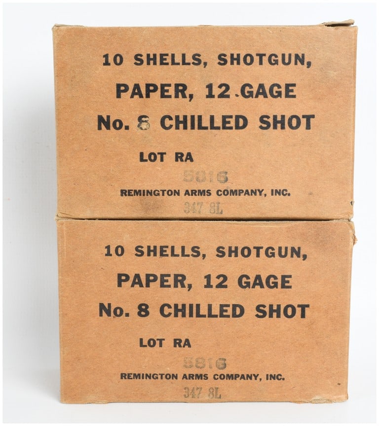 Remington Arms Company Paper Shotgun Ammunition 12 Gauge 20 Rounds: This lot consists of twenty rounds of vintage 12-gauge shotgun ammunition organized into two original ten-count cardboard boxes. The ammunition features reddish-brown paper hulls and brass heads, load
