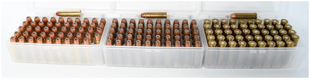 A Lot of 150 Rounds of Remanufactured .32 H&R Magnum Ammunition: This lot consists of 150 rounds of remanufactured .32 H&R Magnum ammunition featuring jacketed hollow point (JHP) projectiles. The ammunition is organized within three clear plastic cases, with two ca