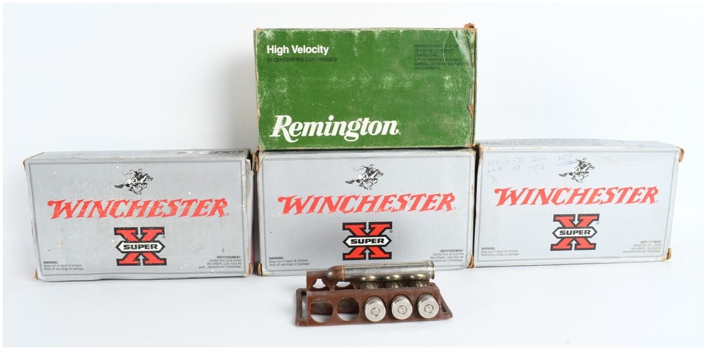 A Lot of 80 Winchester and Remington .458 Winchester Magnum Cartridges and Empty Brass: This lot consists of a total of 80 items of .458 Winchester Magnum centerfire rifle ammunition, specifically 60 live rounds and 20 empty brass casings. The collection is housed in four cardboard boxes