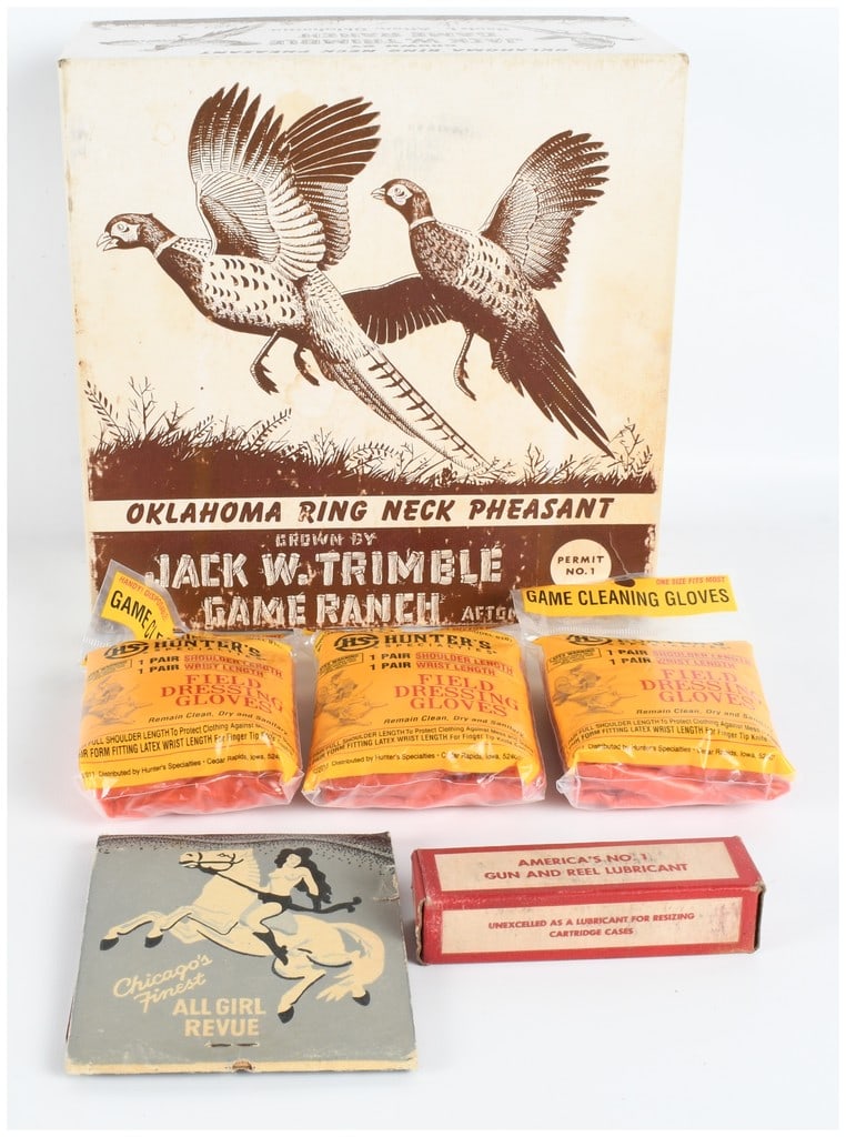 A Collection of Hunting-Related Advertising and Vintage Ephemera: This lot comprises a variety of vintage advertising and hunting-related items. Included is a large cardboard shipping or display box from the Jack W. Trimble Game Ranch in Afton, Oklahoma. The front o