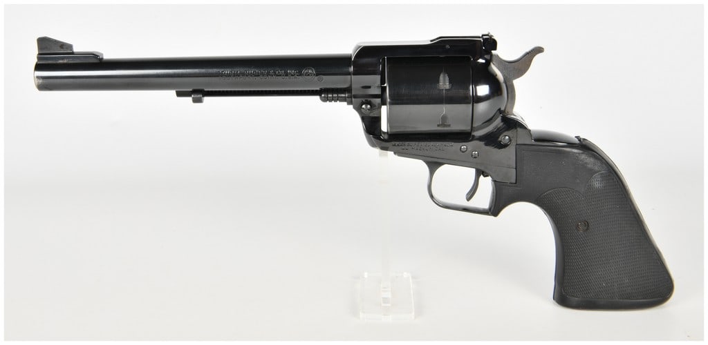 Ruger New Model Super Blackhawk Single Action Revolver .44 Magnum with 7.5 Inch Barrel: This Ruger New Model Super Blackhawk is a single-action revolver chambered in .44 Magnum, designed for target shooting and big game hunting. It features a 7.5-inch barrel equipped with a ramped front 