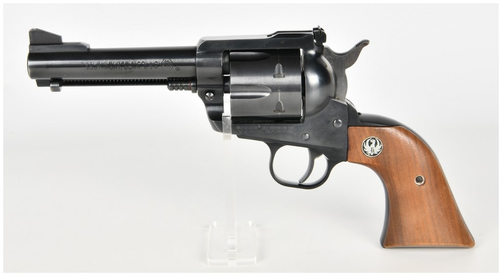 Ruger New Model Blackhawk Single-Action Revolver .357 Magnum with 6.5 Inch Barrel: This is a Ruger New Model Blackhawk single-action revolver chambered for .357 Magnum cartridges. This firearm is equipped with a 6.5-inch barrel and features a traditional blued finish on the major st