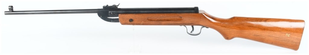 Chinese Break-Barrel Spring-Piston Air Rifle .177 Caliber with 19 Inch Barrel: This Chinese-manufactured air rifle is chambered for .177 caliber pellets and utilizes a spring-piston break-barrel action for cocking and loading. The rifle features a blued finish on the approximate
