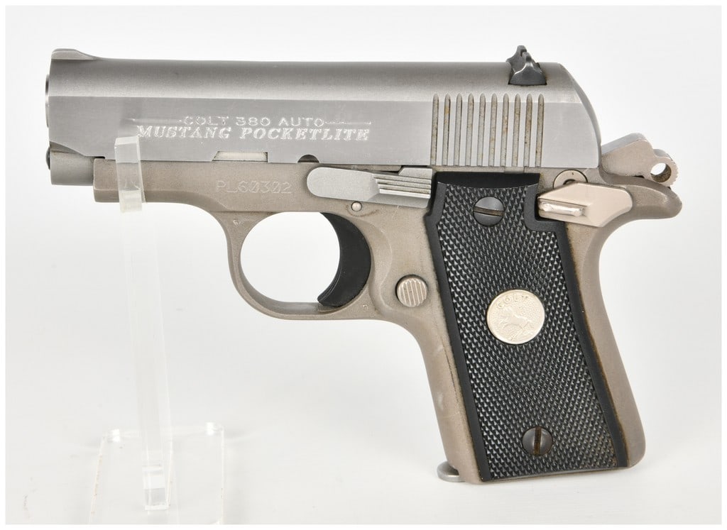 Colt Mustang Pocketlite Semi-Automatic Pistol .380 Auto with 2.75 Inch Barrel: This Colt Mustang Pocketlite is a compact semi-automatic pistol chambered in .380 Auto, configured for concealed carry. It features a 2.75 inch barrel and a two-tone finish consisting of a brushed sta