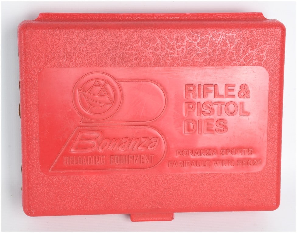 Bonanza Bench Rest Seater Die .25-06 Remington: A single Bonanza Bench Rest seater die chambered for .25-06 Remington, presented in its original red plastic storage case. The die is constructed of steel and features a large knurled upper section de